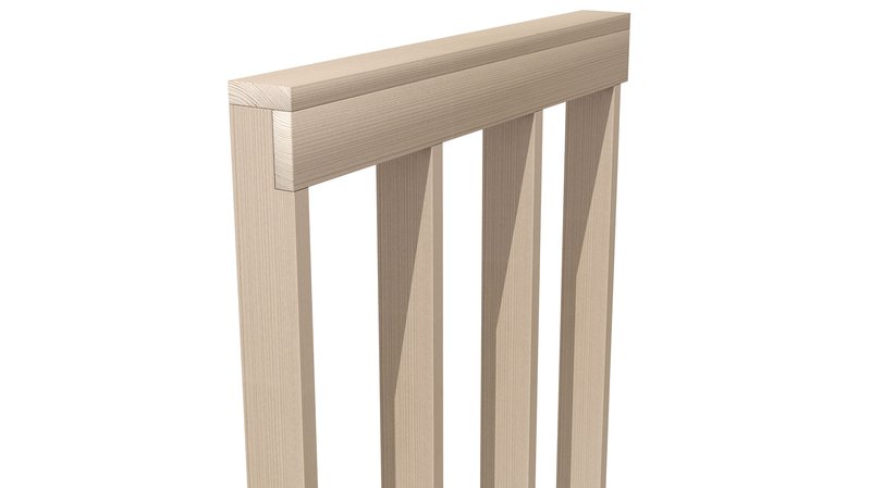Close-up of a pale wood chair back featuring vertical slats and a flat top rail with visible grain detail