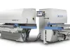 Soukup Wizard 4L woodworking machinery unit with blue conveyor tables and a touchscreen control panel