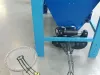 Falach 35 briquette machine with blue hopper, hydraulic mechanism, wire discharge chute and collection bag on workshop floor