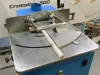 Crossline 500 Copenstick end scribe machine with metal worktable and clamping mechanism, scribing a white window beading profile