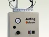 Airfog Defensor wall-mounted misting unit with pressure gauge and twin nozzle arms