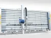 IWM vertical wall saw with blue cutting head mounted on a tall aluminium frame, measuring 2.1m x 4.1m