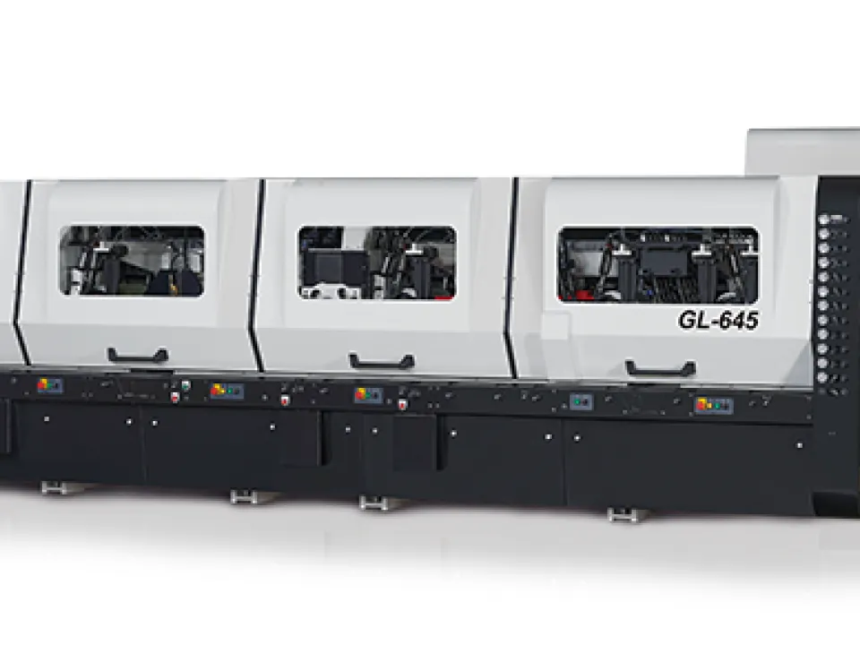 Gau Jing GL-645 four-sided planer moulder machine with multiple processing stations and a side control panel