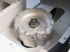 Large circular milling cutter with carbide inserts mounted inside a Soukup Notcher machine
