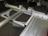 Dominion CP-16M panelsaw with aluminium sliding carriage, ruler guides, and digital display unit in a workshop