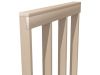 Close-up of a pale wood chair back featuring vertical slats and a flat top rail with visible grain detail